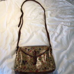 Patricia Nash handbag tan leather w floral design w storage bag zip closure EUC